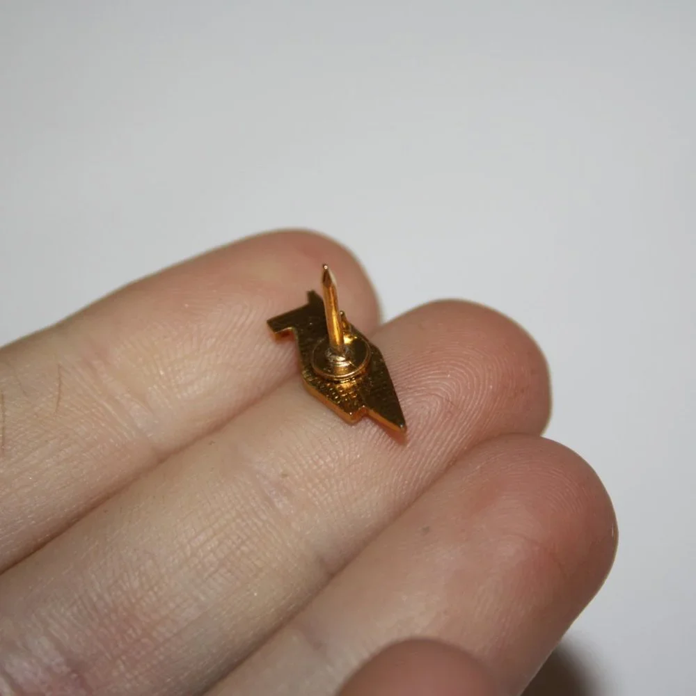 Vintage gold and black lapel pin 5/8
